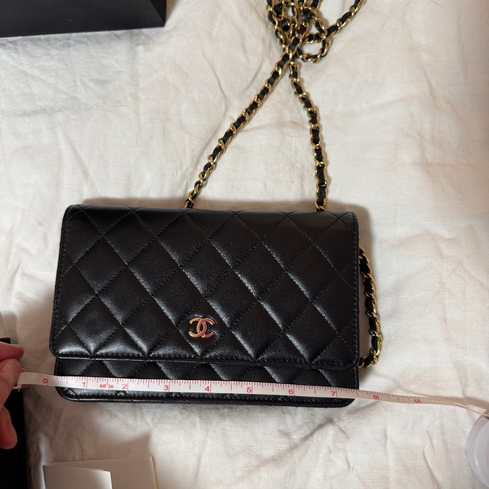 Mint condition Chanel wallet on a chain